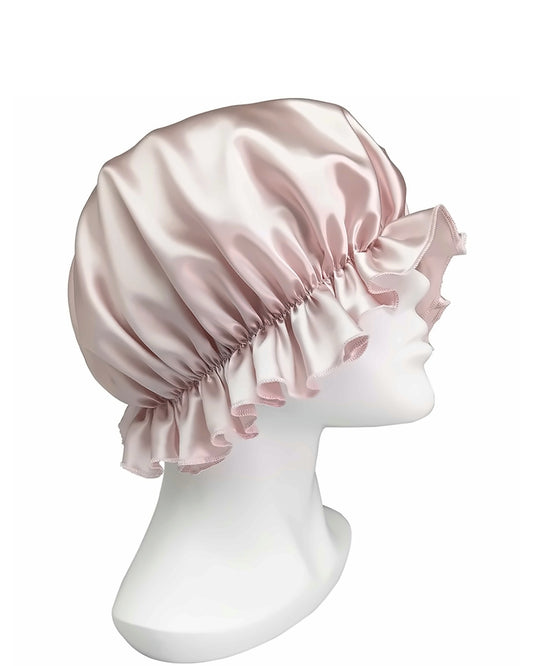 Siluxe Comfort silk bonnet in Rose gold, side product view: ruffle edge and soft elastic