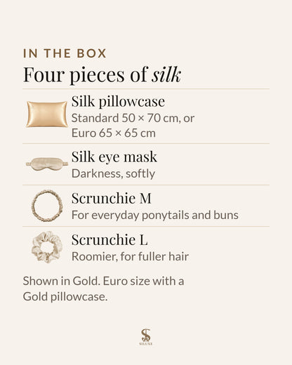 In the Siluxe GiftBox, four pieces of silk: a silk pillowcase in Standard 50 × 70 cm or Euro 65 × 65 cm, a silk eye mask, a scrunchie M and a scrunchie L; shown in Gold