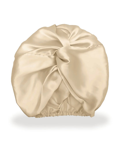 Siluxe Glow silk bonnet in Gold, product view on white: twist-front knot and soft elastic